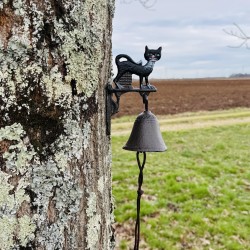 Cast-iron wall bell with cat, front door