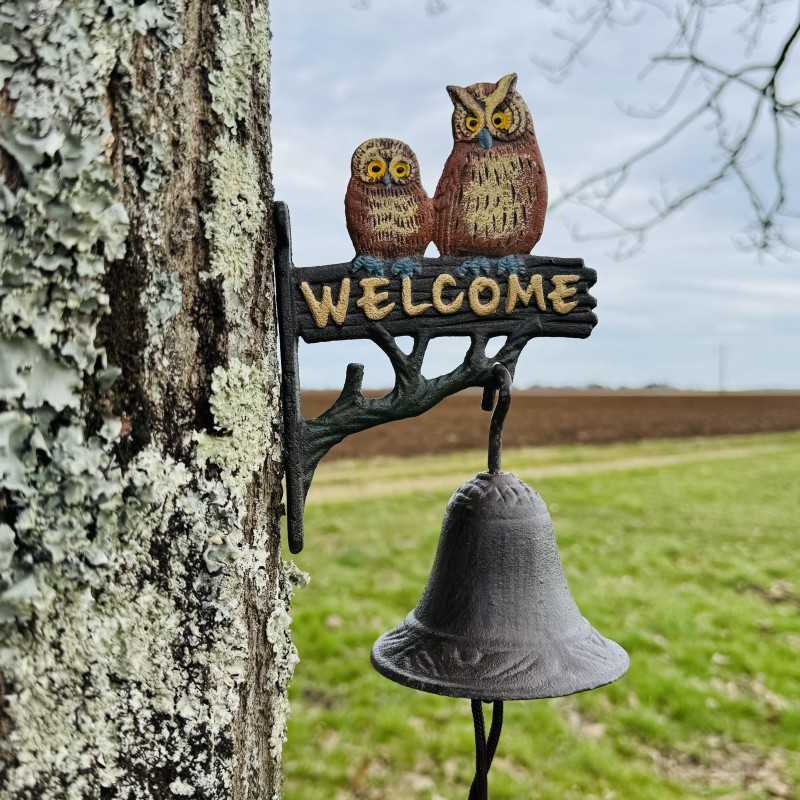 Cast-iron wall-mounted bell with owls and “Welcome” – Originality and a warm welcome on display