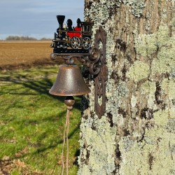 Cast-iron wall bell with locomotive – front view