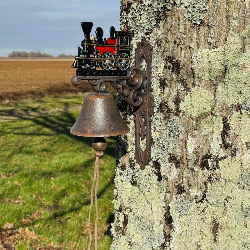 Cast-iron wall bell with locomotive – front view