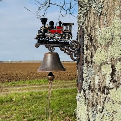 Cast-iron wall bell with locomotive – staged display