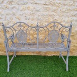 Antique-style metal outdoor bench, rear view