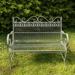 Antique garden bench in verdigris-finished metal