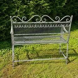 Antique garden bench in patinated verdigris metal, rear view