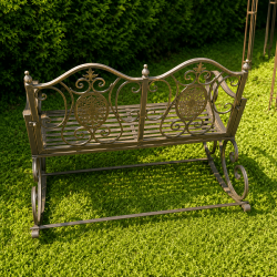 Patina-brown metal garden rocking chair, rear view
