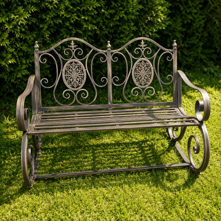 Patina-brown metal garden rocking chair with cast-iron medallions