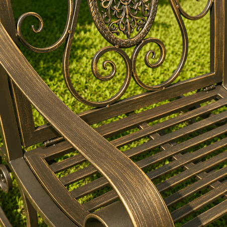 Single-seat garden rocking chair in weathered brown metal with a cast-iron medallion