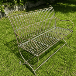 Weathered verdigris and rust-finished metal garden bench – Antique style