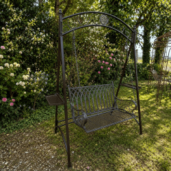 Wrought-iron garden lizard swing