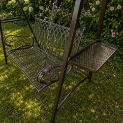 Brown two-seater garden swing with fold-down trays