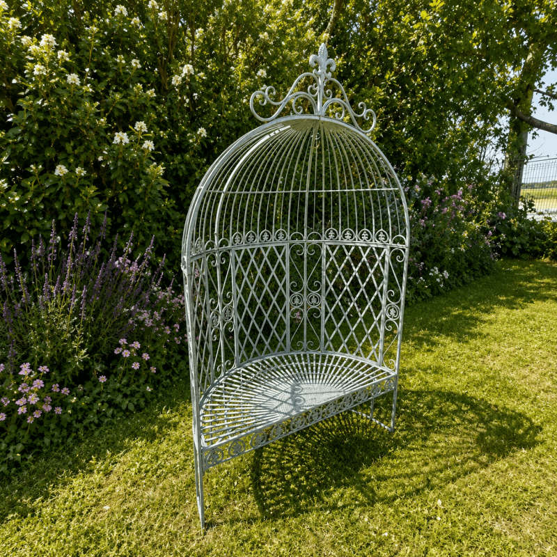 Patinated verdigris metal garden arbor bench, three-quarter view