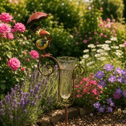 Decorative garden rain gauge, bird under umbrella – side view