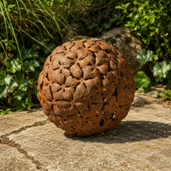 Large spherical metal sculpture with cutout flowers – Large model