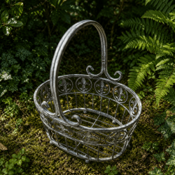 Oval flower-pot holder basket in distressed gray metal with fleur-de-lis – top view of the small one