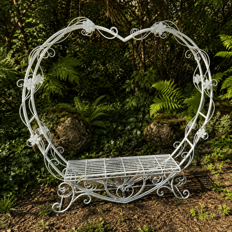 Patinated white metal heart-arch bench