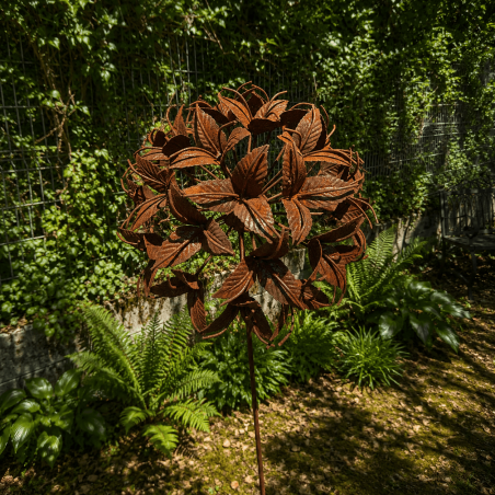 Rust-colored metal flower on a stake