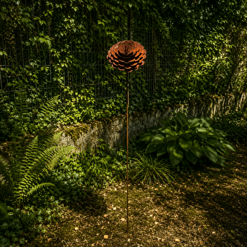 Rust-colored metal rose on a stake – overall view