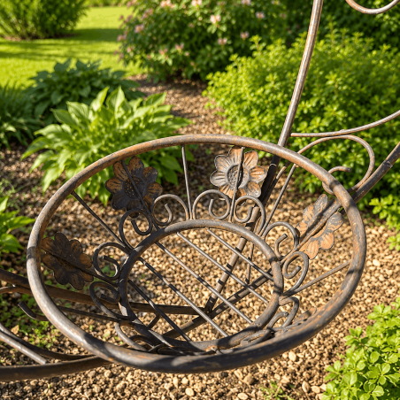 Romantic hanging planter with decorative flowers and scrollwork