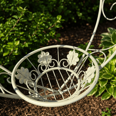 Romantic hanging planter with decorative flowers and scrollwork