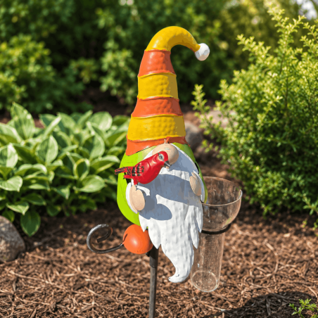 Colourful garden gnome with transparent graduated rain gauge