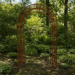 Detail of the decorative scrollwork on the metal garden arch