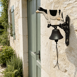 Black and white cow wall-mounted farm bell