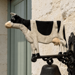 Cast-iron cow doorbell detail
